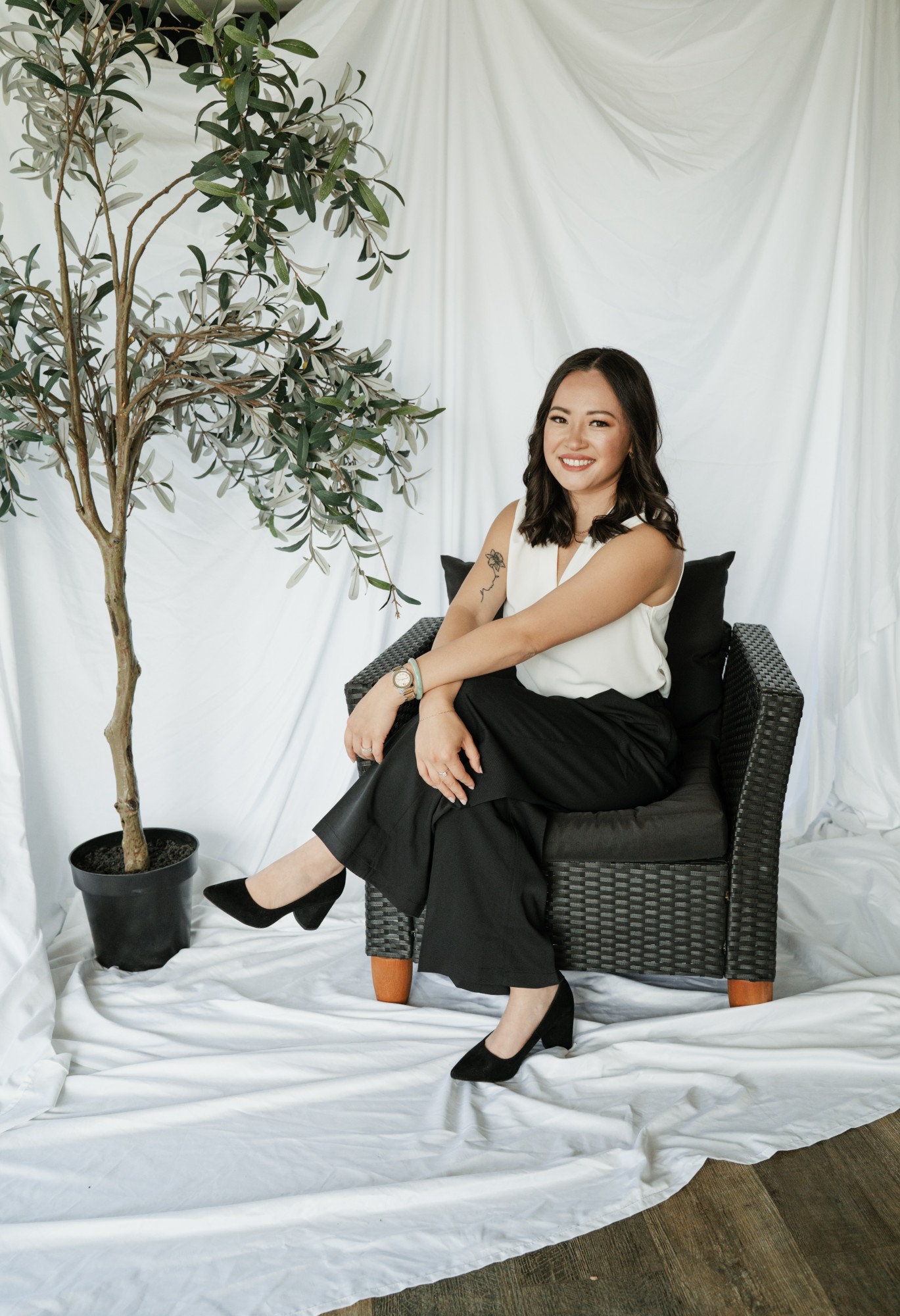 Cindy Penrod, Lily & Key founder, seated in a bright studio setting